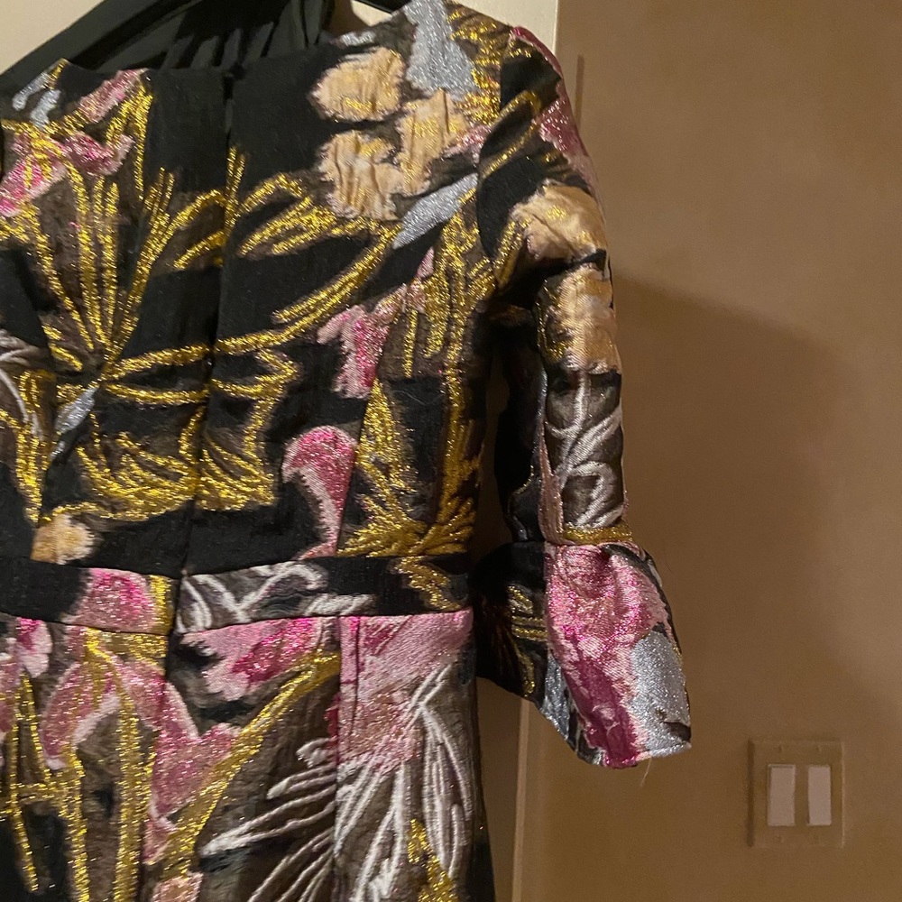 Marchesa Notte Excludive Elbow Trumpet Sleeve.